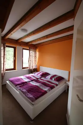 Ein Bett oder Betten in einem Zimmer der Unterkunft Armarova Ihre Ferienpension