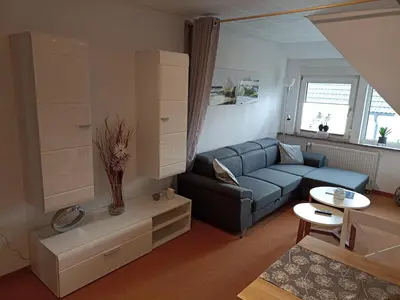 Ein Sitzbereich in der Unterkunft Ferienwohnung Sietland