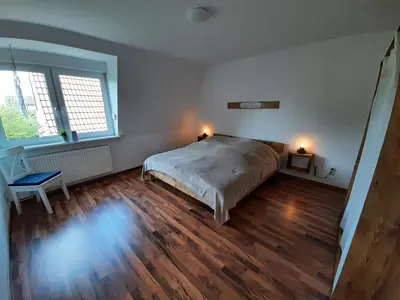 Ein Bett oder Betten in einem Zimmer der Unterkunft Rauszeit-Balje
