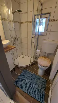 Ein Badezimmer in der Unterkunft Ferienhaus Am Oland