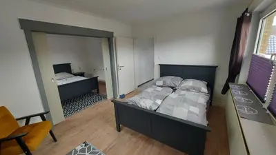 Ein Bett oder Betten in einem Zimmer der Unterkunft Ferienhaus Am Oland