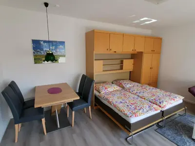 Ein Bett oder Betten in einem Zimmer der Unterkunft Ferienwohnungen Am Ahoibad