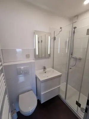 Ein Badezimmer in der Unterkunft Ferienwohnungen Am Ahoibad