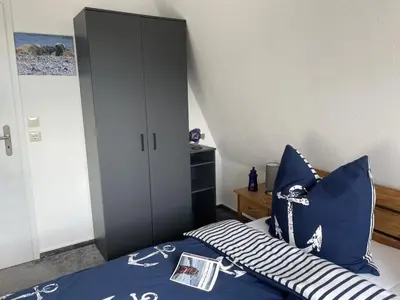 Ein Bett oder Betten in einem Zimmer der Unterkunft Kampweg 26