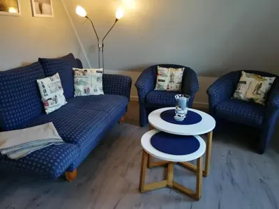 Ein Sitzbereich in der Unterkunft Scharhörn, Ferienwohnung 14