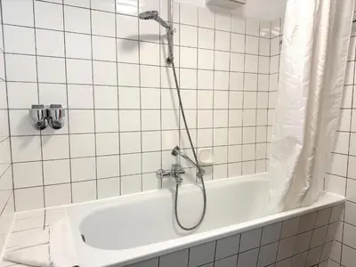 Ein Badezimmer in der Unterkunft Frauenpreiss Whg. 54
