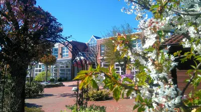 Ein Garten an der Unterkunft Hotel am Hasengarten
