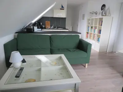Ein Sitzbereich in der Unterkunft Ferienwohnung Herzmuschel