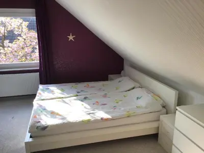 Ein Bett oder Betten in einem Zimmer der Unterkunft Ferienwohnung Seestern