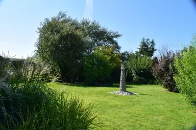 Ein Garten an der Unterkunft Hotel Haus am Meer