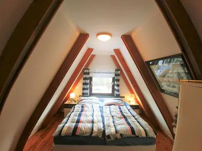 Ein Bett oder Betten in einem Zimmer der Unterkunft Nordseedeich