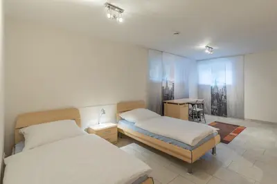 Ein Bett oder Betten in einem Zimmer der Unterkunft Dünenflair Wohnung 2