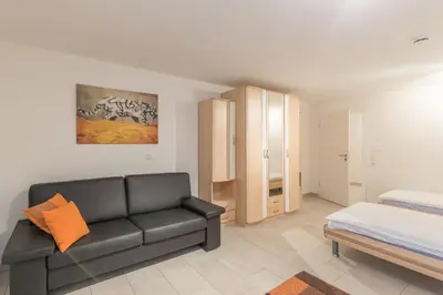 Ein Bett oder Betten in einem Zimmer der Unterkunft Dünenflair Wohnung 2