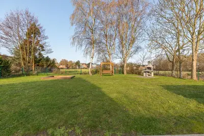 Ein Garten an der Unterkunft Dünenflair Wohnung 2