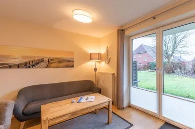 Ein Sitzbereich in der Unterkunft Haus Stranddüne Wohnung 11