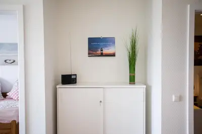 Ein Bett oder Betten in einem Zimmer der Unterkunft Strandchalet Elmo I in Wremen
