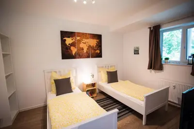 Ein Bett oder Betten in einem Zimmer der Unterkunft Strandchalet Elmo I in Wremen