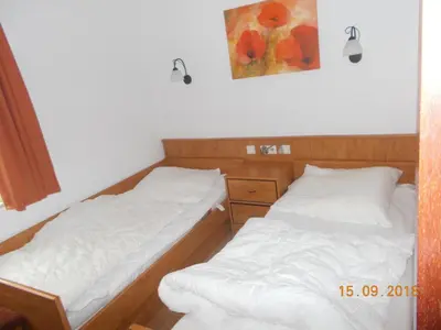 Ein Bett oder Betten in einem Zimmer der Unterkunft Neptunweg