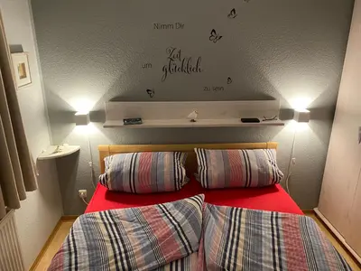 Ein Bett oder Betten in einem Zimmer der Unterkunft Ferienhaus Seebär