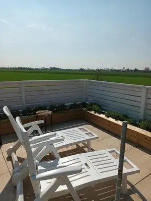 Ein Balkon oder eine Terrasse in der Unterkunft Strandrose