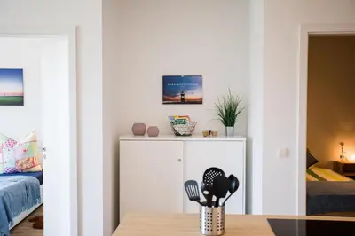 Ein Bett oder Betten in einem Zimmer der Unterkunft Strandchalet Elmo II