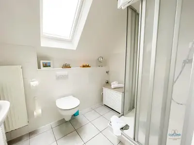 Ein Badezimmer in der Unterkunft Urlaub in der Grimmershörnbucht