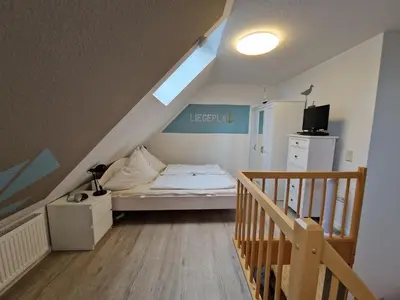 Ein Bett oder Betten in einem Zimmer der Unterkunft Haus Seewind Wohnung 3