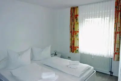 Ein Bett oder Betten in einem Zimmer der Unterkunft Gorch Fock 04