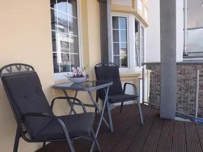 Ein Sitzbereich in der Unterkunft Nordsee 01