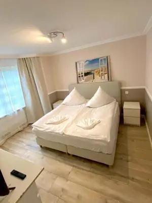 Ein Bett oder Betten in einem Zimmer der Unterkunft Nordsee 02