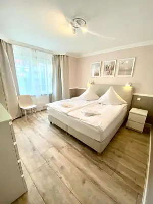 Ein Bett oder Betten in einem Zimmer der Unterkunft Nordsee 02