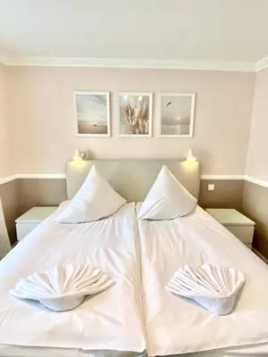 Ein Bett oder Betten in einem Zimmer der Unterkunft Nordsee 02