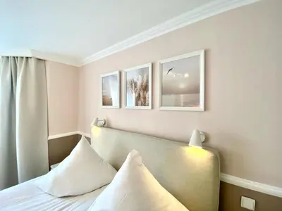 Ein Bett oder Betten in einem Zimmer der Unterkunft Nordsee 02