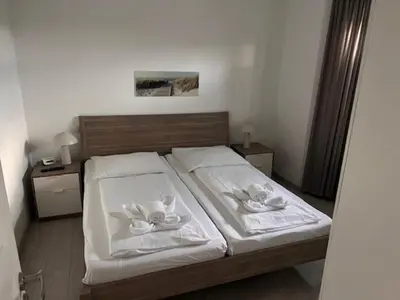 Ein Bett oder Betten in einem Zimmer der Unterkunft Nordsee 04