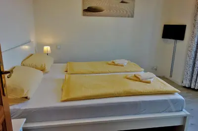 Ein Bett oder Betten in einem Zimmer der Unterkunft Nordsee 05