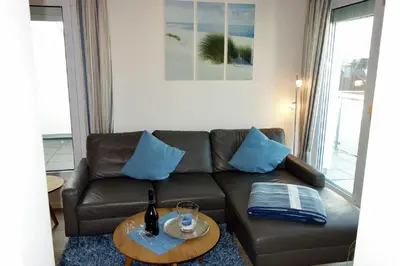 Ein Sitzbereich in der Unterkunft Ocean Dream