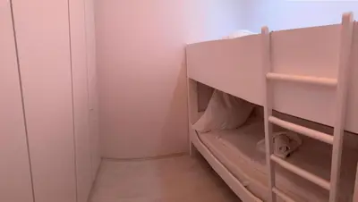 Ein Etagenbett oder Etagenbetten in einem Zimmer der Unterkunft Vogelsand 348