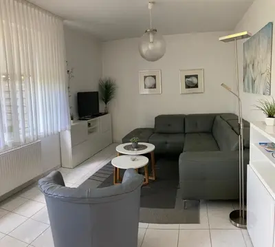 Ein Sitzbereich in der Unterkunft Voßhörn 27 Whg. 1