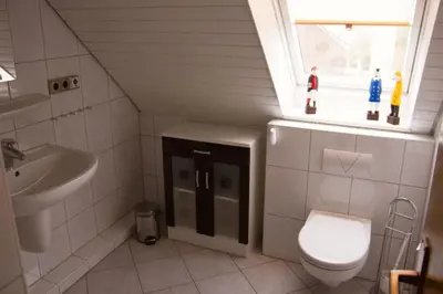 Ein Badezimmer in der Unterkunft Voßhörn 09