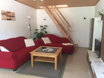 Ein Sitzbereich in der Unterkunft Ferienwohnung bi Klatt tu Hus