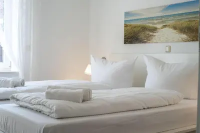 Ein Bett oder Betten in einem Zimmer der Unterkunft Cuxhavener Straße 5/1