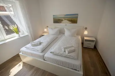 Ein Bett oder Betten in einem Zimmer der Unterkunft Cuxhavener Straße 5/2