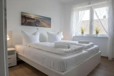 Ein Bett oder Betten in einem Zimmer der Unterkunft Cuxhavener Straße 5/4