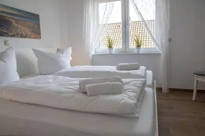 Ein Bett oder Betten in einem Zimmer der Unterkunft Cuxhavener Straße 5/4