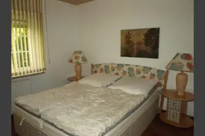 Ein Bett oder Betten in einem Zimmer der Unterkunft Häfchenweg 12 a, Ferienwohnung 3