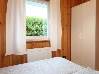 Ein Bett oder Betten in einem Zimmer der Unterkunft Chalet Martin by Interhome