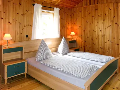 Ein Bett oder Betten in einem Zimmer der Unterkunft Chalet Martin by Interhome