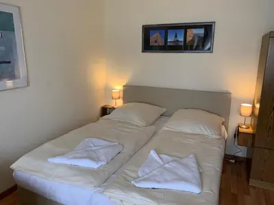 Ein Bett oder Betten in einem Zimmer der Unterkunft Pension Appartementhaus Hus Möhlenbarg