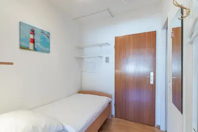 Ein Bett oder Betten in einem Zimmer der Unterkunft Baltic - Wohnung 14