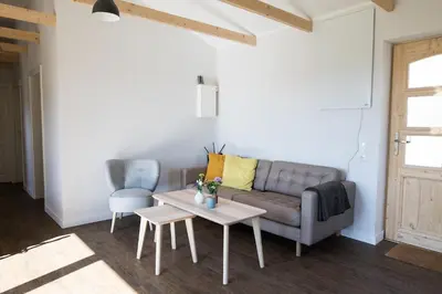 Ein Sitzbereich in der Unterkunft Lytte Hytte - Ferienhaus Wingst